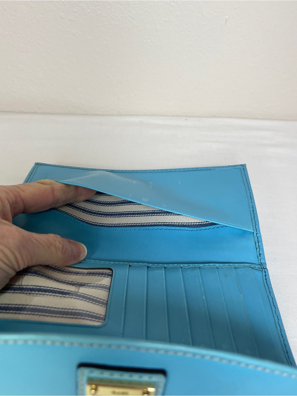 Dooney & Bourke Turquoise Leather Fold-Over Wallet with Gold Plaque - Picture 13 of 14